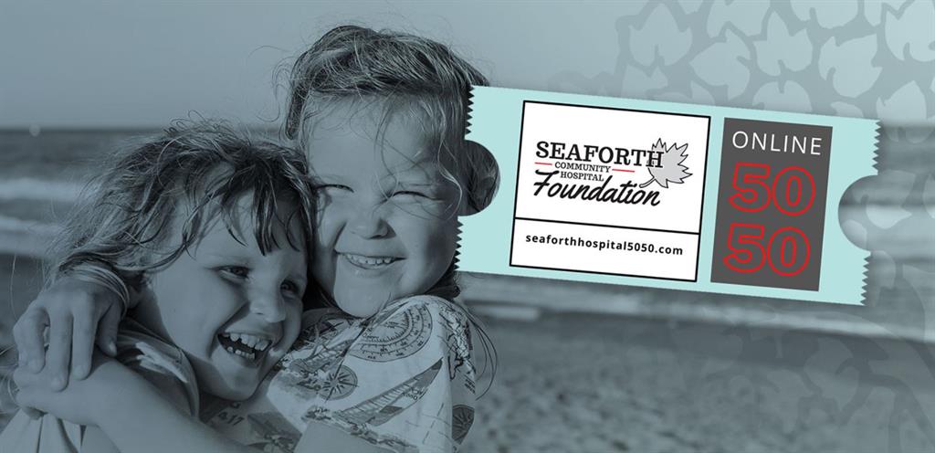 Two children hugging on a beach with the Seaforth Community Hospital Foundation 50/50 Draw Logo 